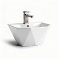 Ceramic freestanding sink with modern angular design and chrome faucet
